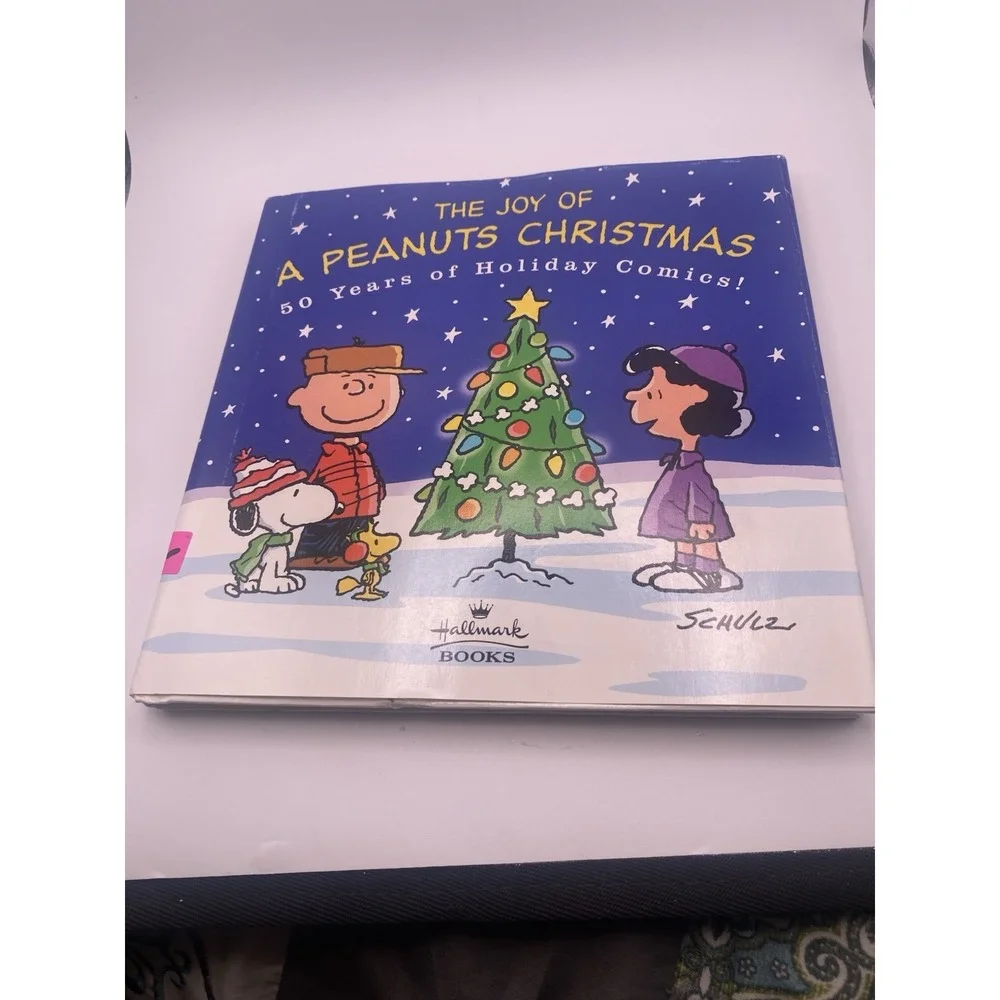 The Joy of a Peanuts Christmas: 50 Years of Holiday Comics!